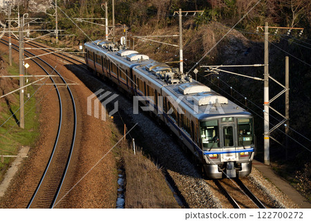 Four 521 series local trains running on the former Hokuriku Main Line Four 521 series local trains running on the former Hokuriku Main Line 122700272