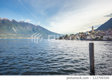 Lake Garda with Limone Sul Garda town and mountains in background, Italy, Europe. 122700300