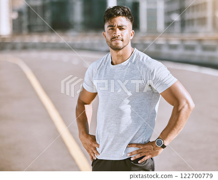 Fitness, sports and runner with motivation, wellness goals and vision in city, town or downtown. Portrait of active, athletic or healthy man on street for routine running workout, exercise or trainin Fitness, sports and runner with motivation, wellness goals and vision in city, town or downtown. Portrait of active, athletic or healthy man on street for routine running workout, exercise or trainin 122700779