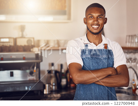 Business owner standing with arms crossed at a cafe, showing pride and success working at a restaurant. Portrait of a waiter, employee or worker giving smile at bakery, looking successful and happy Business owner standing with arms crossed at a cafe, showing pride and success working at a restaurant. Portrait of a waiter, employee or worker giving smile at bakery, looking successful and happy 122700948