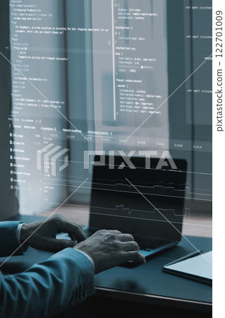 Close-up of coding interface projected over workspace. Fictional programming lines, website development elements 122701009