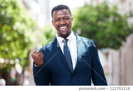 Portrait of businessman, leader or CEO celebration, winner and happy outside in the city. Manager with happiness and motivation for business success and profit with a smile and pride for achievement 122701218
