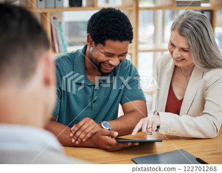 Female manager boss or leader meeting with an employee with a digital tablet. Intern, project supervisor discuss online work or report in the boardroom. Businessman and lady talk strategy development Female manager boss or leader meeting with an employee with a digital tablet. Intern, project supervisor discuss online work or report in the boardroom. Businessman and lady talk strategy development 122701268