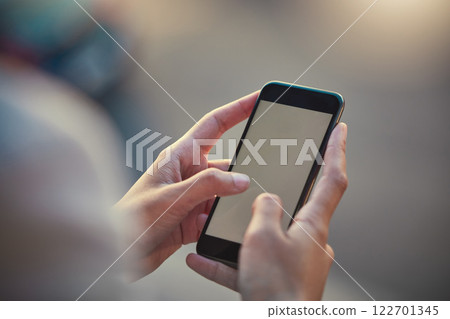 Smartphone, closeup and mockup of mobile screen while hands are typing. Communication with 5g technology and internet on cellphone. Person holding phone to connect with people while outdoors. 122701345