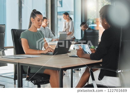 Office corporate business female employees, coworkers and team working online with digital electronics. Diverse advertising and social media marketing company or agency staff busy with client work Office corporate business female employees, coworkers and team working online with digital electronics. Diverse advertising and social media marketing company or agency staff busy with client work 122701689