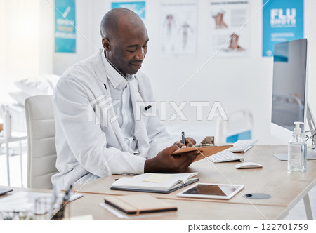 Doctor working on schedule, planning date or medical note for diagnosis report in a hospital office. Healthcare expert doing paper work, checking records or writing signature on insurance document Doctor working on schedule, planning date or medical note for diagnosis report in a hospital office. Healthcare expert doing paper work, checking records or writing signature on insurance document 122701759