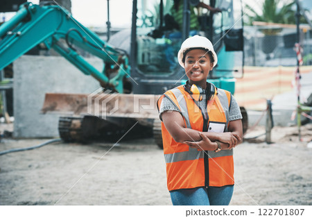 Happy woman construction worker with a ready to work smile on a job site outside. Portrait of a proud young building development manager about to start working on engineering industrial plans Happy woman construction worker with a ready to work smile on a job site outside. Portrait of a proud young building development manager about to start working on engineering industrial plans 122701807