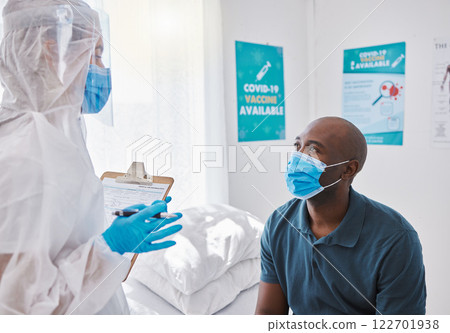 Covid checklist, form or insurance paperwork of patient symptoms with healthcare worker asking health, illness or medical questions in hospital. Doctor consulting, talking about risk of disease virus 122701938