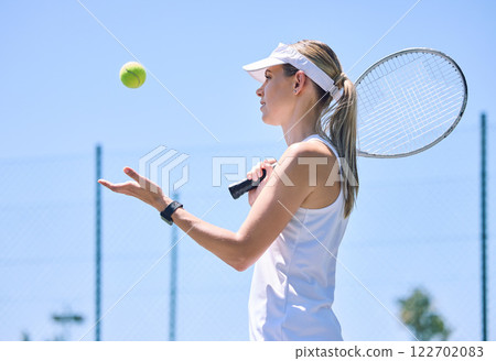 Sports, tennis ball and player ready to play a game on the court for fitness, healthy and exercise training in summer. Girl, woman and athlete with energy playing a fun game for an outdoor workout 122702083