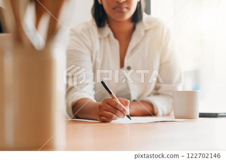 Writing notes, to do list and budget with paperwork, document and pen to sign, letter and write application form at home. Female hands planning insurance, tax and bills with investment and insurance 122702146