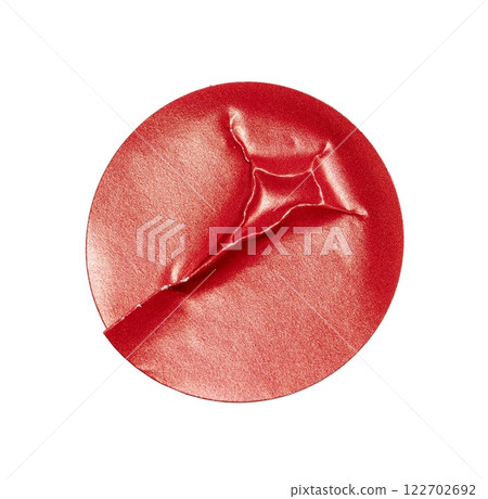 Blank red round crumpled paper promotion sticker label cutout isolated on a white background 122702692