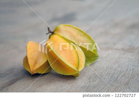 Close up of Carambola fruit on wood table,selective focus 122702727