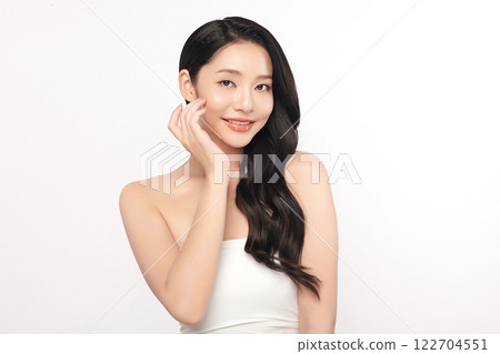 Beautiful young asian woman with clean fresh skin on white background, Face care, Facial treatment, Cosmetology, beauty and spa, Asian women portrait. Beautiful young asian woman with clean fresh skin on white background, Face care, Facial treatment, Cosmetology, beauty and spa, Asian women portrait. 122704551