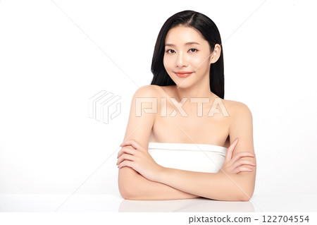 Beautiful young asian woman with clean fresh skin on white background, Face care, Facial treatment, Cosmetology, beauty and spa, Asian women portrait. Beautiful young asian woman with clean fresh skin on white background, Face care, Facial treatment, Cosmetology, beauty and spa, Asian women portrait. 122704554