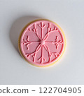Light pink round icing cookies, white background. AI generated image. 122704905