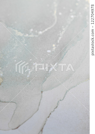Beautiful abstract alcohol ink art in soft hues creating a serene atmosphere 122704978