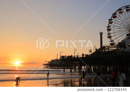 People watching the sunset in Santa Monica, a scenic spot for sunsets 122706345