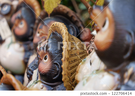 A scene of Raku-yaki raccoon figurines lined up A scene of Raku-yaki raccoon figurines lined up 122706414