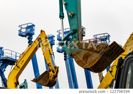 Several elevated work platforms are lined up 122706594