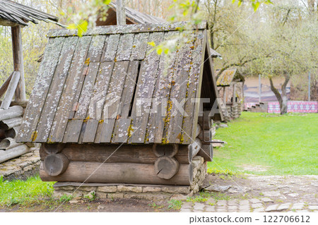 Old wooden well. Rustic well. Village. Old wooden well. Rustic well. Village. 122706612