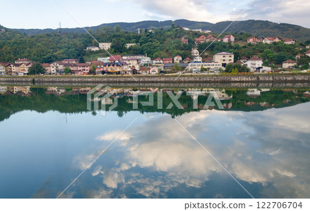 View of Visegrad, Serb Republic, Bosnia with reflections of clouds in the river Drina View of Visegrad, Serb Republic, Bosnia with reflections of clouds in the river Drina 122706704