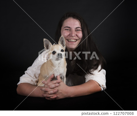 chihuahua and woman in studio 122707008
