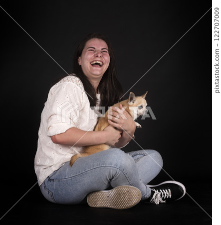 chihuahua and woman in studio 122707009