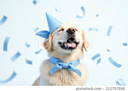 Happy golden retriever with blue ribbon and falling confetti - Birthday, Christmas, New Year, Why 122707898