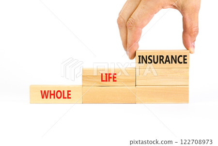 Whole life insurance symbol. Concept words Whole life insurance on beautiful wooden blocks. Beautiful white table white background. Businessman hand. Business whole life insurance concept. Copy space. Whole life insurance symbol. Concept words Whole life insurance on beautiful wooden blocks. Beautiful white table white background. Businessman hand. Business whole life insurance concept. Copy space. 122708973