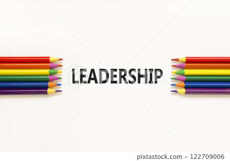 Leadership symbol. Concept word Leadership on beautiful white paper. Beautiful white paper background. Beautiful colored pencils. Business leadership concept. Copy space. Leadership symbol. Concept word Leadership on beautiful white paper. Beautiful white paper background. Beautiful colored pencils. Business leadership concept. Copy space. 122709006