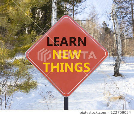 Learn new things symbol. Concept words Learn new things on beautiful red road sign. Beautiful snow forest background. Business motivational learn new things concept. Copy space. Learn new things symbol. Concept words Learn new things on beautiful red road sign. Beautiful snow forest background. Business motivational learn new things concept. Copy space. 122709034