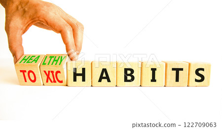 Healthy or toxic habits symbol. Concept words Healthy habits or Toxic habits on beautiful wooden blocks. Beautiful white table white background. Business healthy or toxic habits concept. Copy space. Healthy or toxic habits symbol. Concept words Healthy habits or Toxic habits on beautiful wooden blocks. Beautiful white table white background. Business healthy or toxic habits concept. Copy space. 122709063