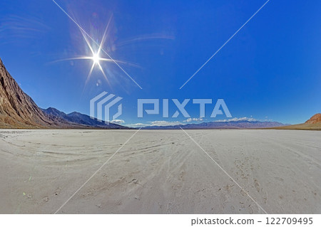 A scenic boardwalk leading through the salt flats of Death Valley 122709495
