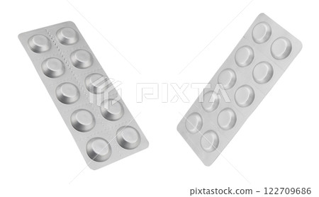 Macro shot pile of tablets pill in silver blister packaging isolated on white background. Aluminium foil blister pack. Pharmacy products. Medicine pills and drugs close up. Pills background 122709686