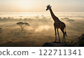 Majestic giraffe overlooking misty savannah at sunrise 122711341