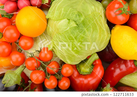 Ripe vegetables and fruits. Bright background. 122711633