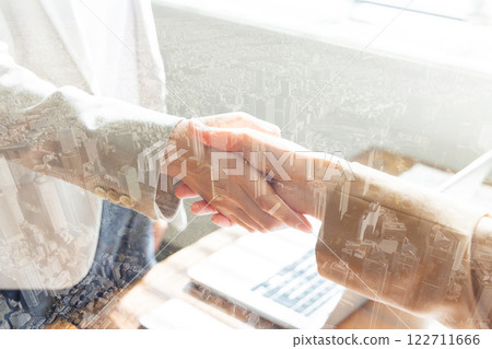 Two businessmen shaking hands 122711666