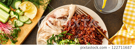 Chicken breast with red rice and salad mix with seasonal organic vegetables Chicken breast with red rice and salad mix with seasonal organic vegetables 122711687
