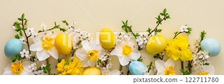 Spring flowers and Easter eggs 122711780