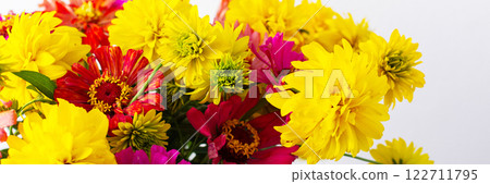 This vibrant bouquet of colorful Zinnia and Rudbeckia Goldquelle flowers brings a cheerful touch to home decor, ideal for a bright and seasonal summer arrangement, banner This vibrant bouquet of colorful Zinnia and Rudbeckia Goldquelle flowers brings a cheerful touch to home decor, ideal for a bright and seasonal summer arrangement, banner 122711795