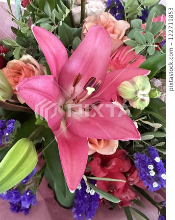 Colorful floral bouquet arrangement, flowers in bloom. Floral background. Colorful floral bouquet arrangement, flowers in bloom. Floral background. 122711853