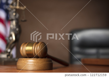 Wooden gavel on judge's table Wooden gavel on judge's table 122712159