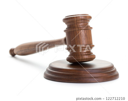 Judge's gavel on white 122712210