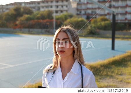 Caring Doctor Helping Patients in an Emergency Zone Caring Doctor Helping Patients in an Emergency Zone 122712949