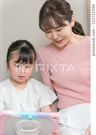 Mom and her 9 year old daughter Mom and her 9 year old daughter 122715589