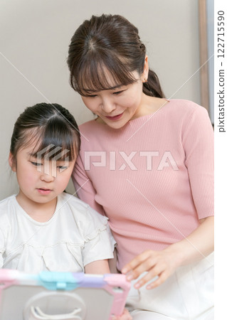 Mom and her 9 year old daughter Mom and her 9 year old daughter 122715590