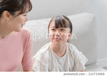 Mom and her 9 year old daughter 122715660