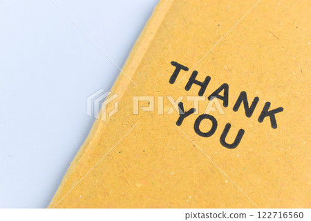 thank you wording on cardboard box texture on white background thank you wording on cardboard box texture on white background 122716560