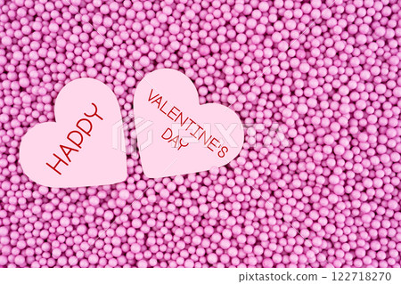 Happy Valentine's Day background. Top view of a heart-shaped on foam beads. 122718270