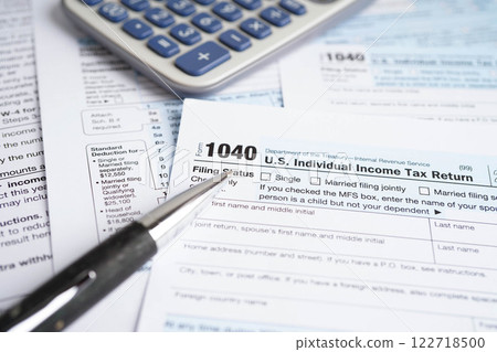 Tax form 1040 U.S. Individual Income Tax Return, business finance. Tax form 1040 U.S. Individual Income Tax Return, business finance. 122718500